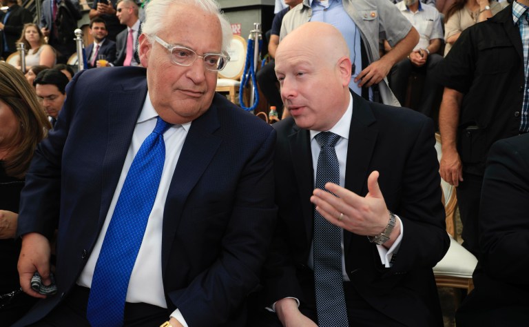 U.S. Ambassador to Israel David Friedman, left, and White House Mideast envoy Jason Greenblatt attend the opening of an ancient road at the City of David, a popular archaeological and tourist site in the Palestinian neighborhood of Silwan in east Jerusalem. The site is located on what many believe to be the ruins of the biblical King David's ancient capital and see as centerpieces of ancient Jewish civilization, but critics accuses the operators of pushing a nationalistic agenda at the expense of local Palestinian residents. 