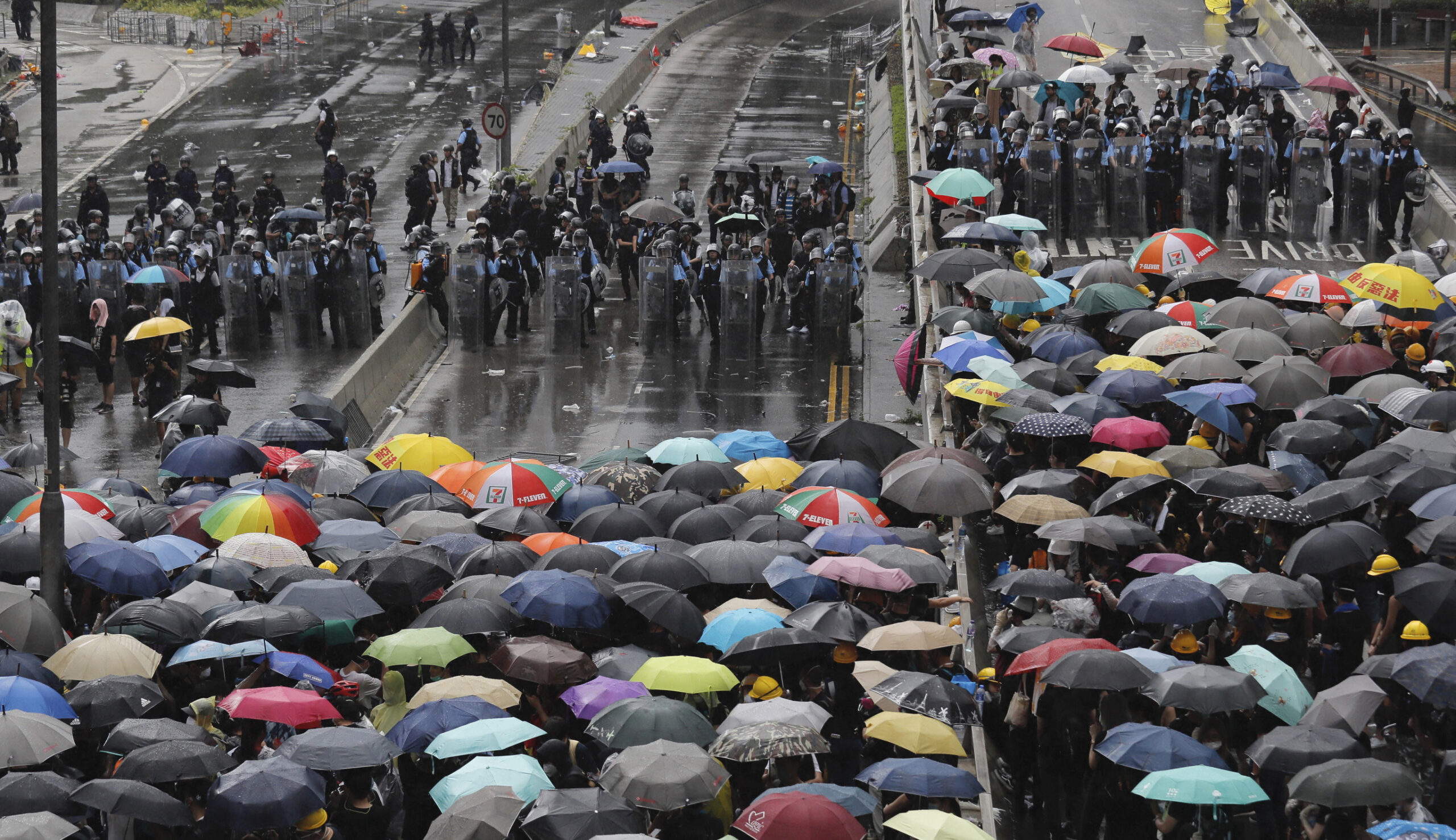 Hong Kong protesters destroy public building, locked in standoff with police