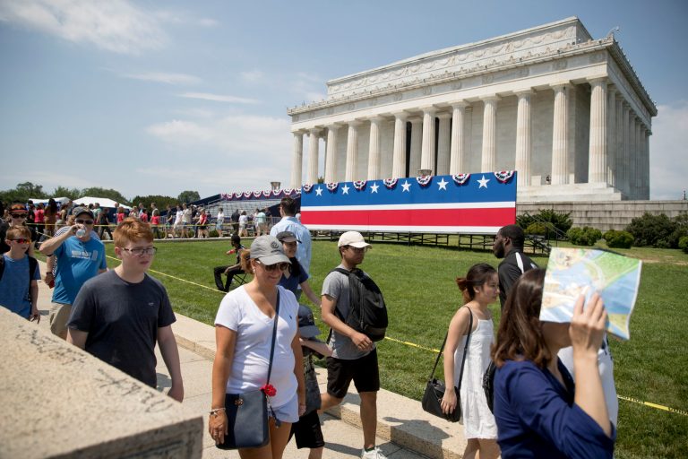 Visitors to the Lincoln Memorial are limited to a single walkway as workers set up for President Donald Trump's 'Salute to America' event honoring service branches on Independence Day, Tuesday, July 2, 2019, in Washington. President Donald Trump is promising military tanks along with "Incredible Flyovers & biggest ever Fireworks!" for the Fourth of July. (AP Photo/Andrew Harnik)