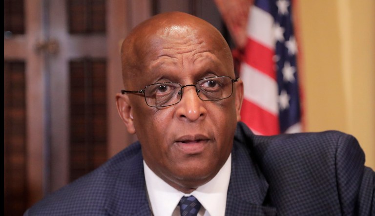 Baltimore Mayor Bernard "Jack" Young speaks to a supporter following a news conference.