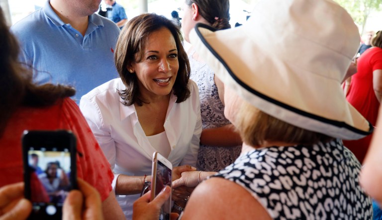 Democratic presidential candidate Sen. Kamala Harris greets local residents during the West Des Moines Democrats' annual picnic on Wednesday in West Des Moines, Iowa.