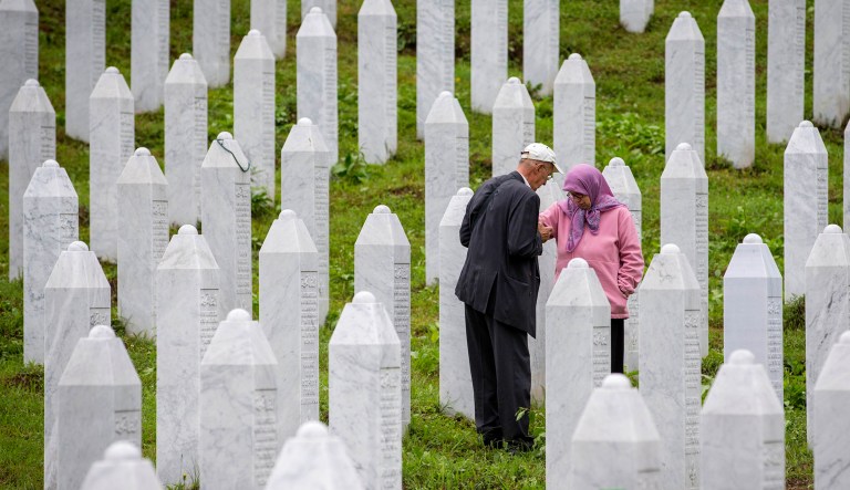 Relatives of victims visit the memorial cemetery in Potocari near Srebrenica, Bosnia.