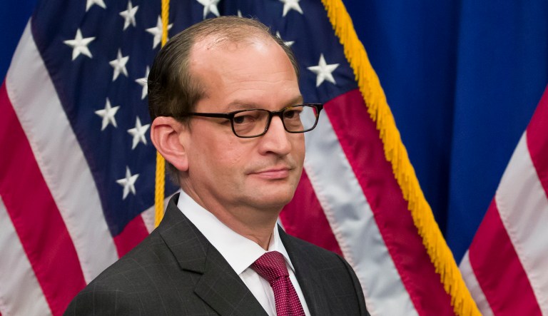 Labor Secretary Alex Acosta arrives for a media availability at the Department of Labor in Washington. 