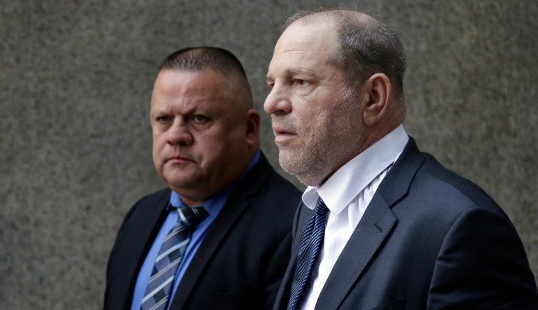Former movie mogul Harvey Weinstein, right, leaves State Supreme Court following a hearing related to his sexual assault case, Thursday, July 11, 2019, in New York. 