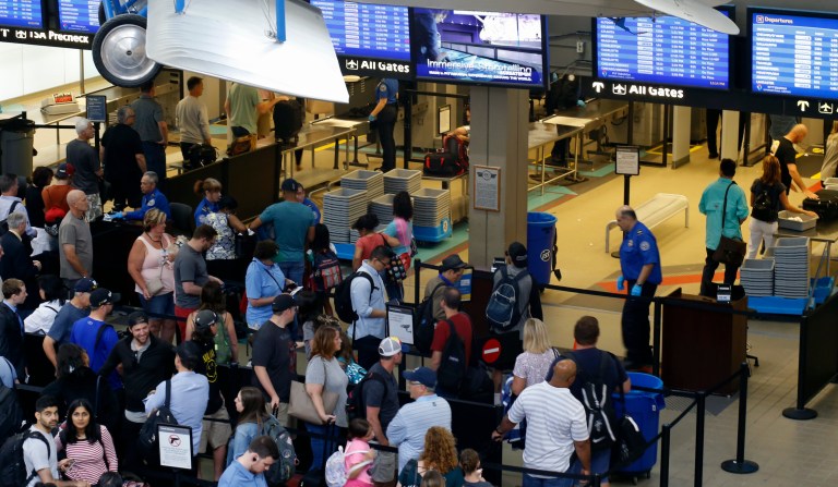 TSA union president says hiring and overtime freeze will cause travel delays