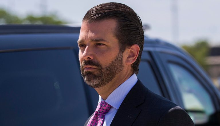 Donald Trump Jr., the son of President Donald Trump, steps off Air Force One with President Donald Trump as they arrive at General Mitchell International Airport, Friday, July 12, 2019, in Milwaukee. 