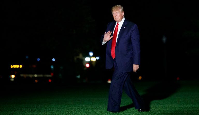 President Donald Trump waves as he walks from Marine One and across the South Lawn at the White House in Washington, Friday, July 12, 2019, as he returns from Cleveland, Ohio. 