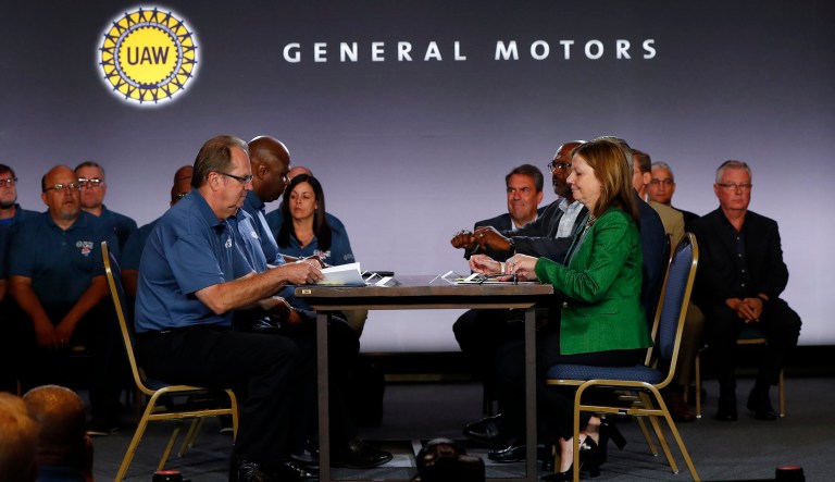 United Auto Workers President Gary Jones, left, and General Motors Chairman and Chief Executive Officer Mary Barra sit to open their contract talks in Detroit, Tuesday, July 16, 2019.
