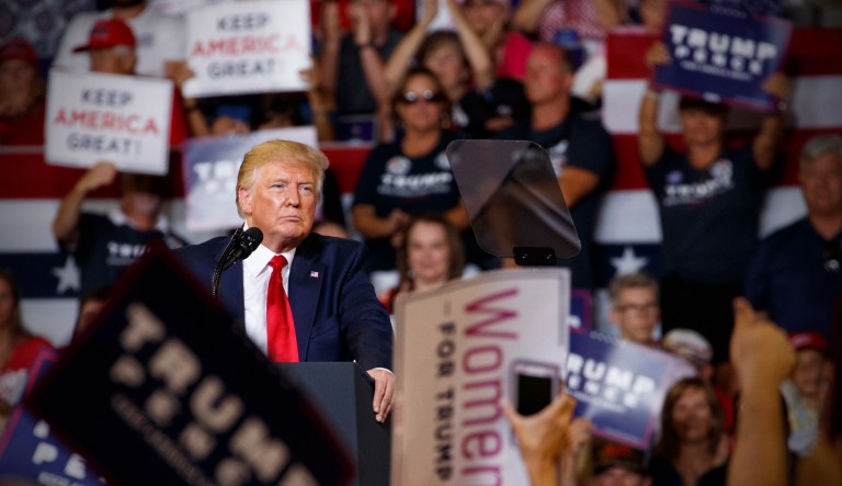 President Trump pauses as he speaks at a campaign rally at Williams Arena in Greenville, North Carolina.