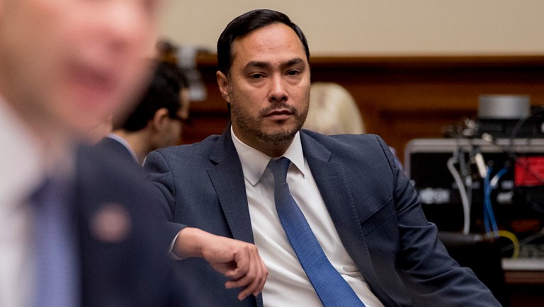 Rep. Joaquin Castro, D-Texas, center, sits in the audience as Acting Secretary of Homeland Security Kevin McAleenan, foreground, appears before a House Committee on Oversight and Reform hearing on Capitol Hill in Washington, Thursday, July 18, 2019. (AP Photo/Andrew Harnik)