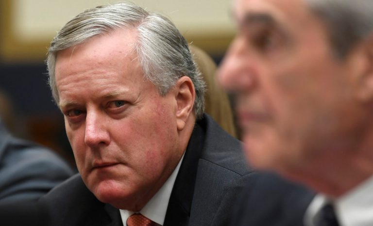 Rep. Mark Meadows, R-N.C., left, listens as former special counsel Robert Mueller, right, testifies on Capitol Hill in Washington, Wednesday, July 24, 2019, before the House Judiciary Committee hearing on his report on Russian election interference. 