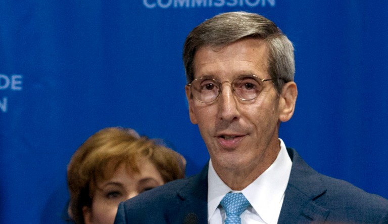 Federal Trade Commission Chairman Joe Simons speaks during a news conference.