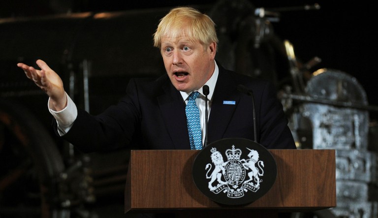 Britain's Prime Minister Boris Johnson speaks at an event.
