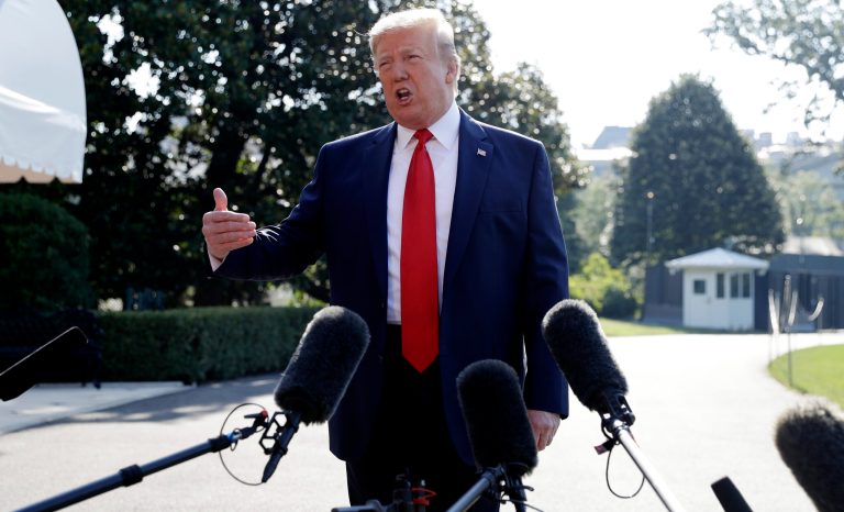 President Trump talks with reporters before departing for an event to celebrate the 400th anniversary celebration of the first representative assembly at Jamestown, Virginia.