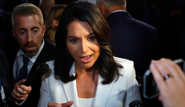 Rep. Tulsi Gabbard, D-Hawaii, answers questions after the second of two Democratic presidential primary debates hosted by CNN Thursday in the Fox Theatre in Detroit.