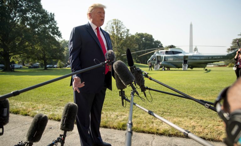 President Donald Trump speaks to members of the media on the South Lawn of the White House in Washington, Wednesday, Aug. 7, 2019.