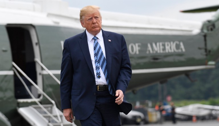 President Trump is seen near the Marine One helicopter.