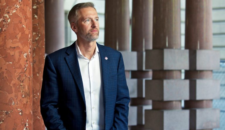 In this Aug. 5, 2019 photo, Portland Mayor Ted Wheeler poses for a photo in Portland, Oregon.
