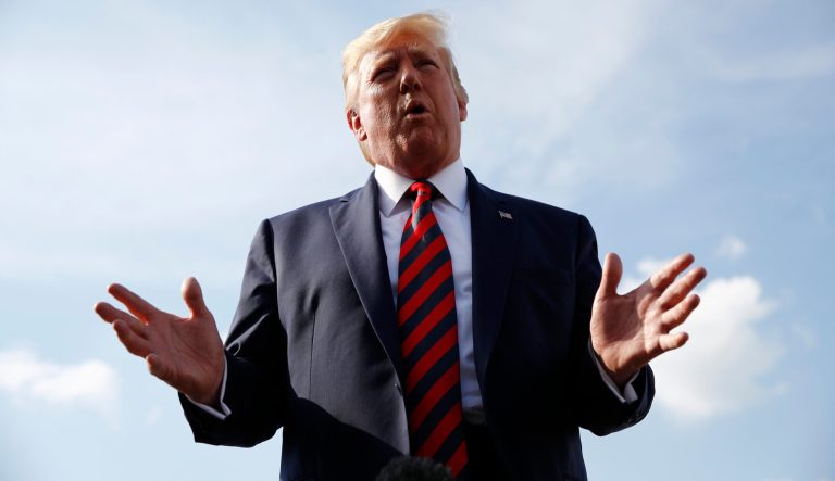 President Donald Trump speaks with reporters before boarding Air Force One with first lady Melania Trump at Morristown Municipal Airport in Morristown, N.J., Sunday, Aug. 18, 2019, en route to Andrews Air Force Base, Md. 