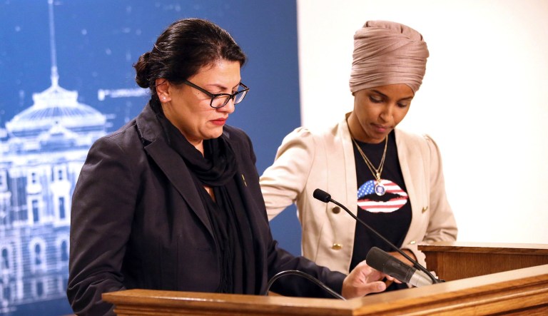Rep. Ilhan Omar, D-Minnesota, right, consoles Rep. Rashida Tlaib, D-Michigan, as Tlaib talked about Israel's refusal to allow them to visit the country during a news conference Monday at the State Capitol in St. Paul, Minnesota.