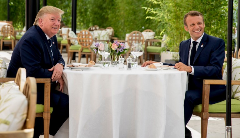 President Trump sits for lunch with French President Emmanuel Macron, right, at the Hotel du Palais in Biarritz, France, on Saturday.