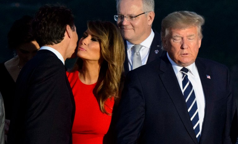 Prime Minister Justin Trudeau greets Melania Trump as she arrives for a family photo with President Donald Trump, during the G7 Summit in Biarritz, France, Sunday, Aug. 25, 2019.  