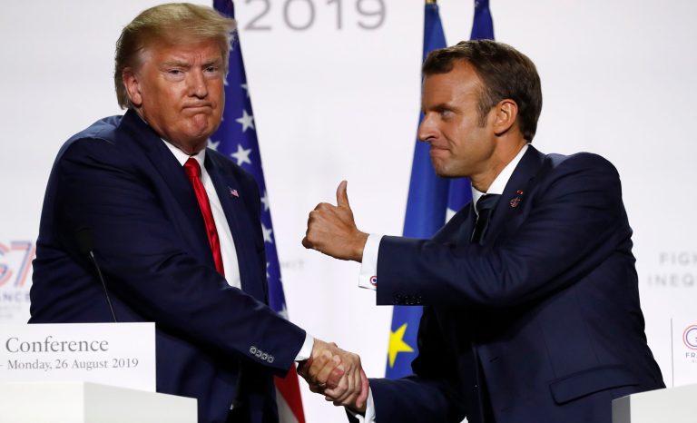 French President Emmanuel Macron and U.S President Donald Trump shake hands during the final press conference during the G7 summit Monday, Aug. 26, 2019 in Biarritz, southwestern France. 