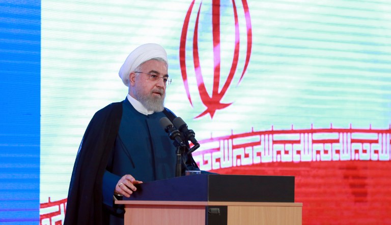 In this photo released by the official website of the office of the Iranian Presidency, President Hassan Rouhani speaks in a ceremony in Tehran, Iran.