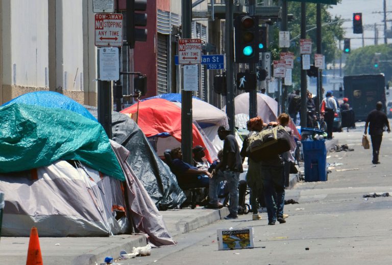 Tents housing homeless line a street in downtown Los Angeles. The Los Angeles Homeless Services Authority has failed to meet goals for placing people into permanent housing and for referring them to substance abuse and mental health treatment, according to a city audit released Wednesday, Aug. 28, 2019.