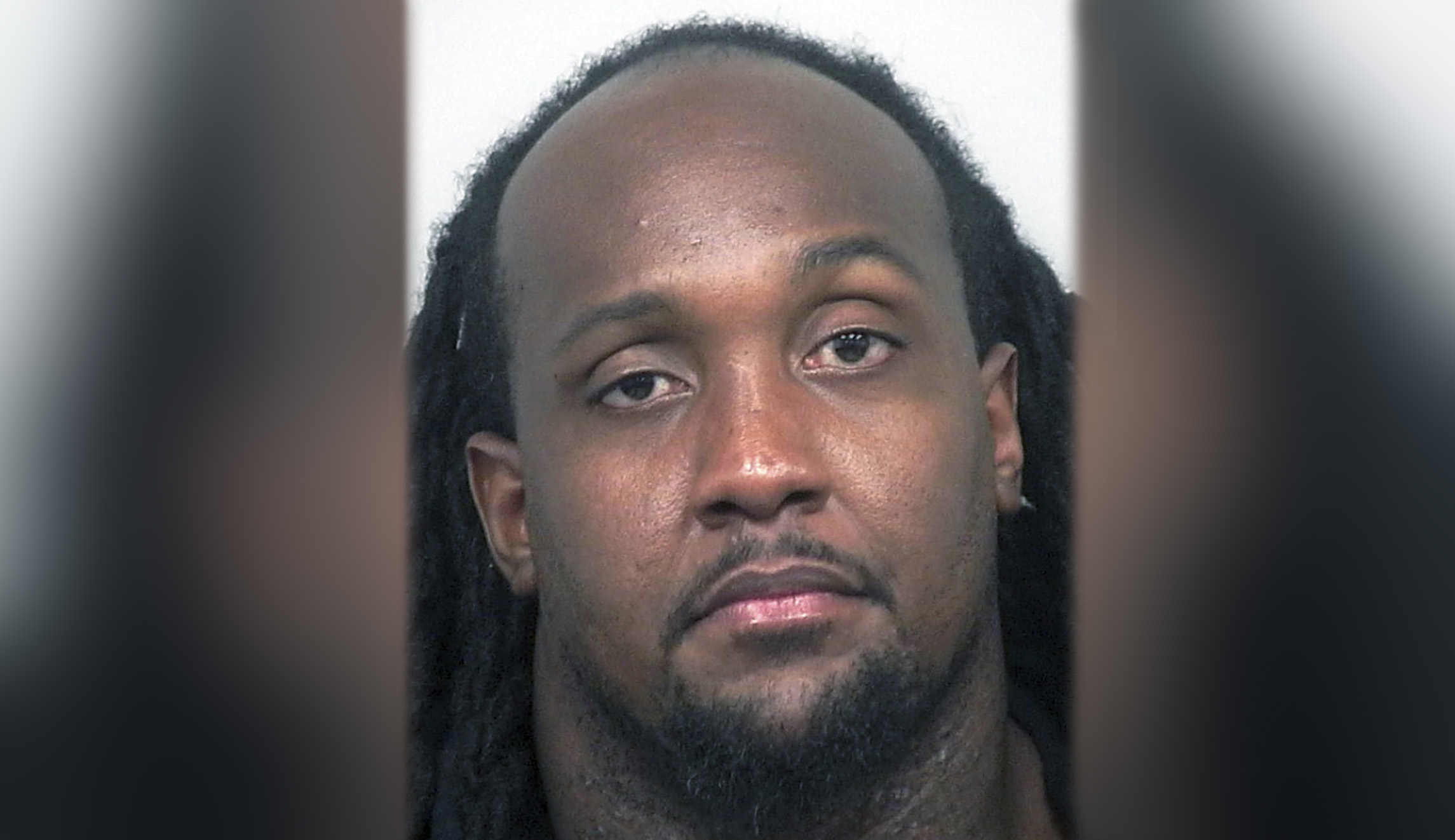 Ex-NFL star charged with destroying his own restaurants after claiming hate crime