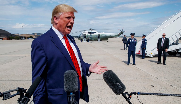 President Trump talks with reporters after arriving at Andrews Air Force Base, Thursday, Sept. 26, 2019, in Andrews Air Force Base, Md.