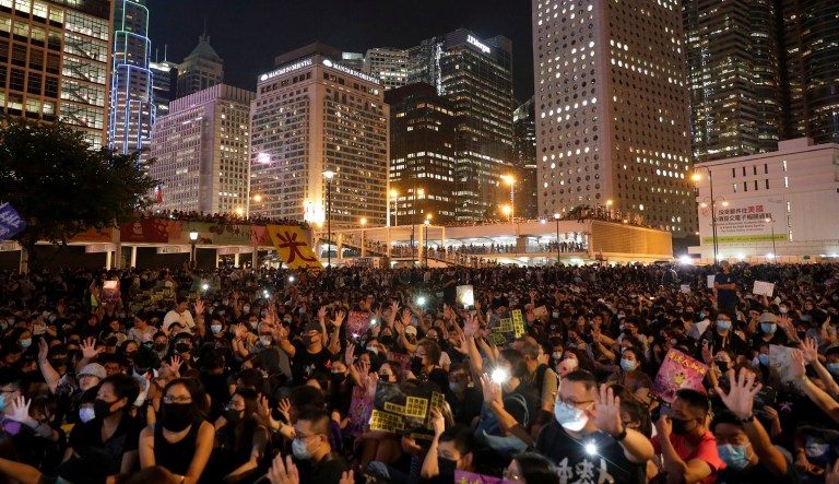 Protesters flashing their smartphones lights as they stage a rally at Edinburgh Place in Hong Kong.