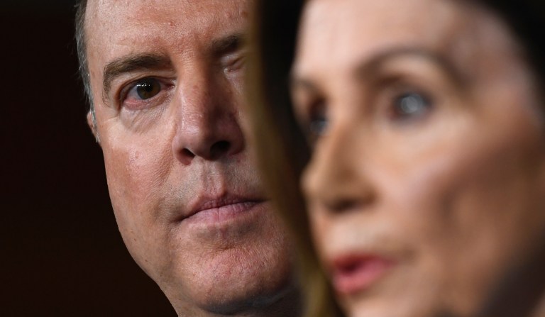 House Intelligence Committee Chairman Rep. Adam Schiff, D-Calif., left, listens as House Speaker Nancy Pelosi of Calif., right, speaks during a news conference on Capitol Hill in Washington, Wednesday, Oct. 2, 2019.