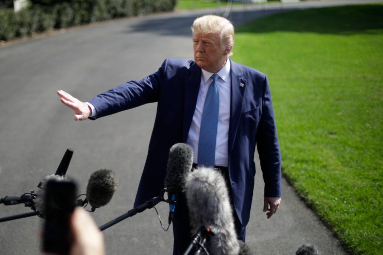 President Donald Trump gestures while speaking to the media on the South Lawn of the White House in Washington, Friday.
