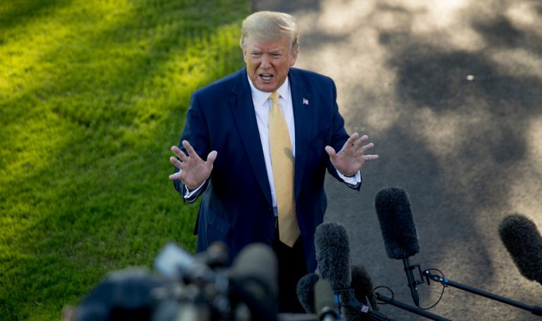President Trump speaks to members of the media on the South Lawn of the White House in Washington, Friday, Oct. 11, 2019, before boarding Marine One for a short trip to Andrews Air Force Base, Md., and then on to Louisiana for a rally. 