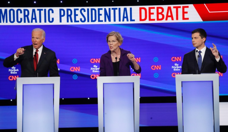 Democratic presidential candidate former Vice President Joe Biden, left, Sen. Elizabeth Warren, D-Mass., middle, and South Bend Mayor Pete Buttigieg participate in a Democratic presidential primary debate hosted by CNN/New York Times at Otterbein University, Tuesday, Oct. 15, 2019, in Westerville, Ohio.