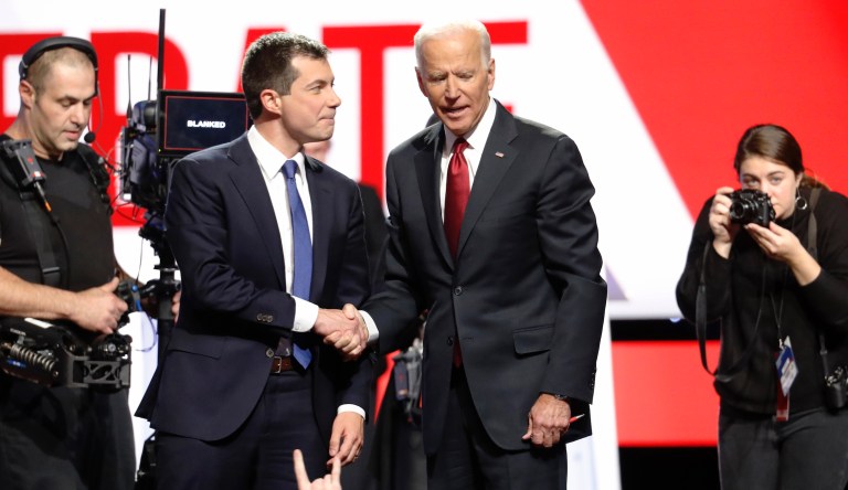 Democratic presidential candidate South Bend Mayor Pete Buttigieg, left, and former Vice President Joe Biden talk on stage following a Democratic presidential primary debate at Otterbein University, Tuesday, Oct. 15, 2019, in Westerville, Ohio.