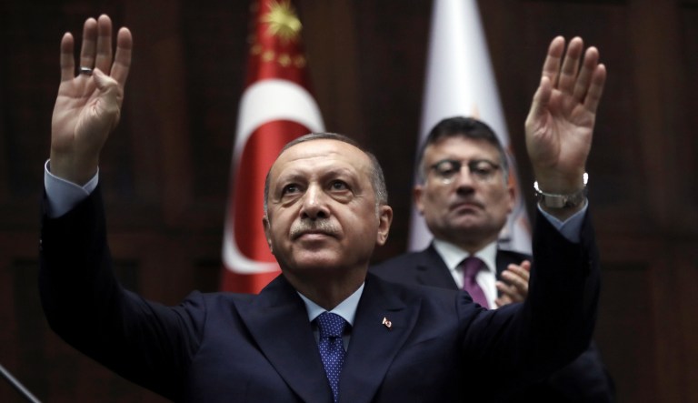 Turkish President Recep Tayyip Erdogan gestures as he addresses his ruling party legislators at the Parliament, in Ankara, Wednesday, Oct 16, 2019. Erdogan called Wednesday on Syrian Kurdish fighters to leave a designated border area in northeast Syria 'as of tonight' for Turkey to stop its military offensive, defying pressure on him to call a ceasefire and halt its incursion into Syria.