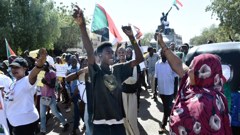 In this Monday, Dec. 23, 2019 photo, Christians march through the streets to celebrate the birth of Jesus in Khartoum Bahri, Sudan, north of the capital Khartoum. More than eight months after the army forced out long-ruling autocrat Omar al-Bashir, who upheld harsh interpretations of Islamic laws, Sudanese Christians are hoping for more religious freedom. 