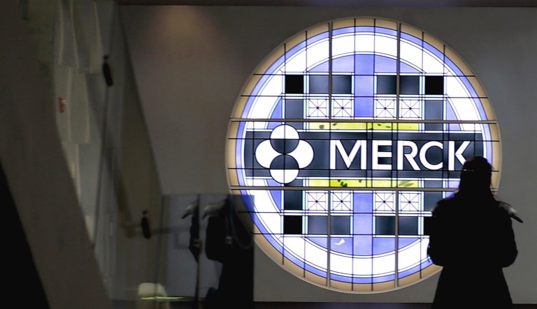 The Merck logo is seen on a stained glass panel at a Merck company building in Kenilworth, N.J. 