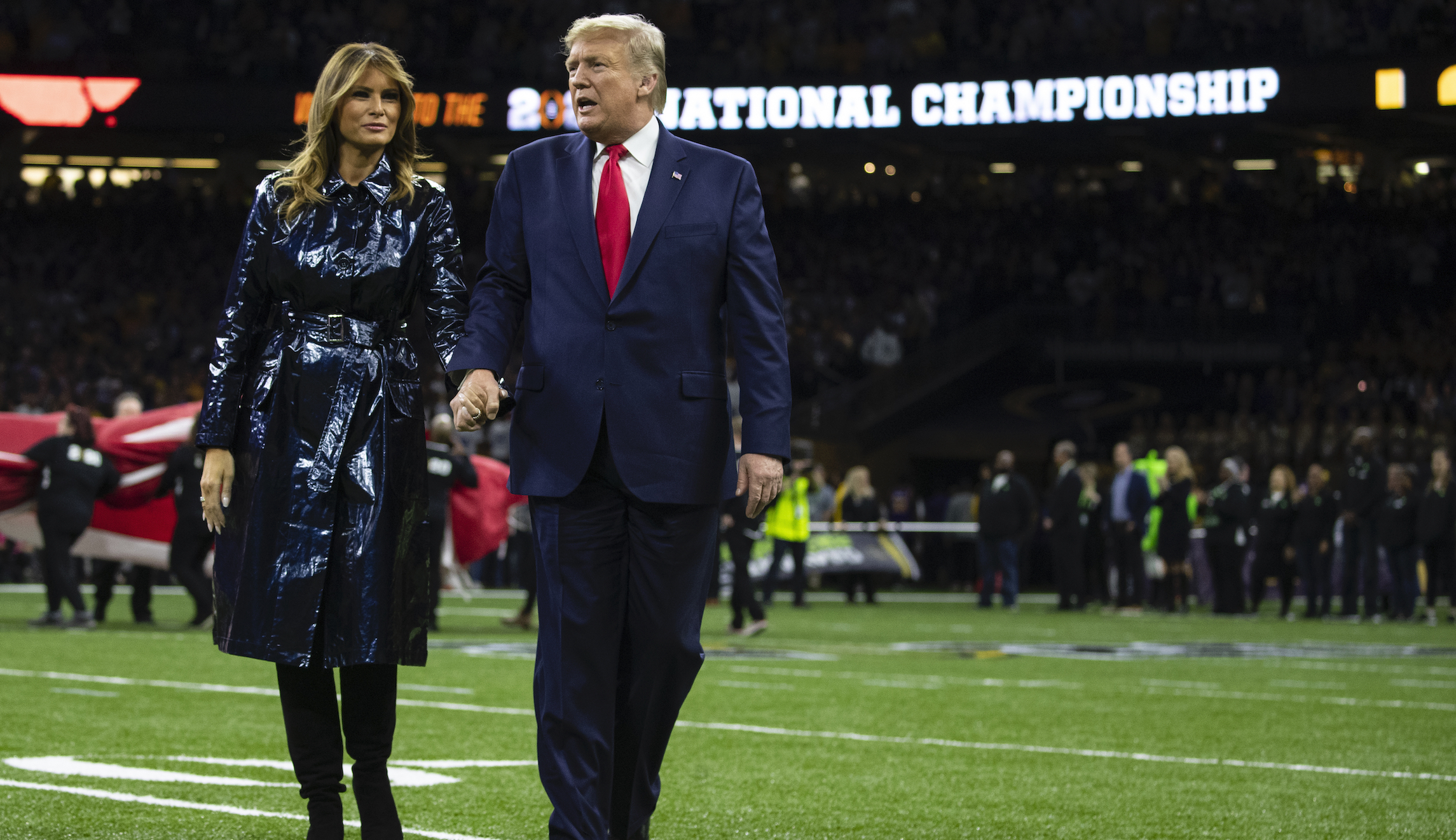 Minnesota Teacher of the Year winner kneels during national anthem at college football game attended by Trump