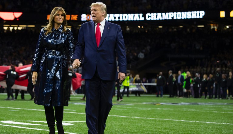 Minnesota Teacher of the Year winner kneels during national anthem at college football game attended by Trump