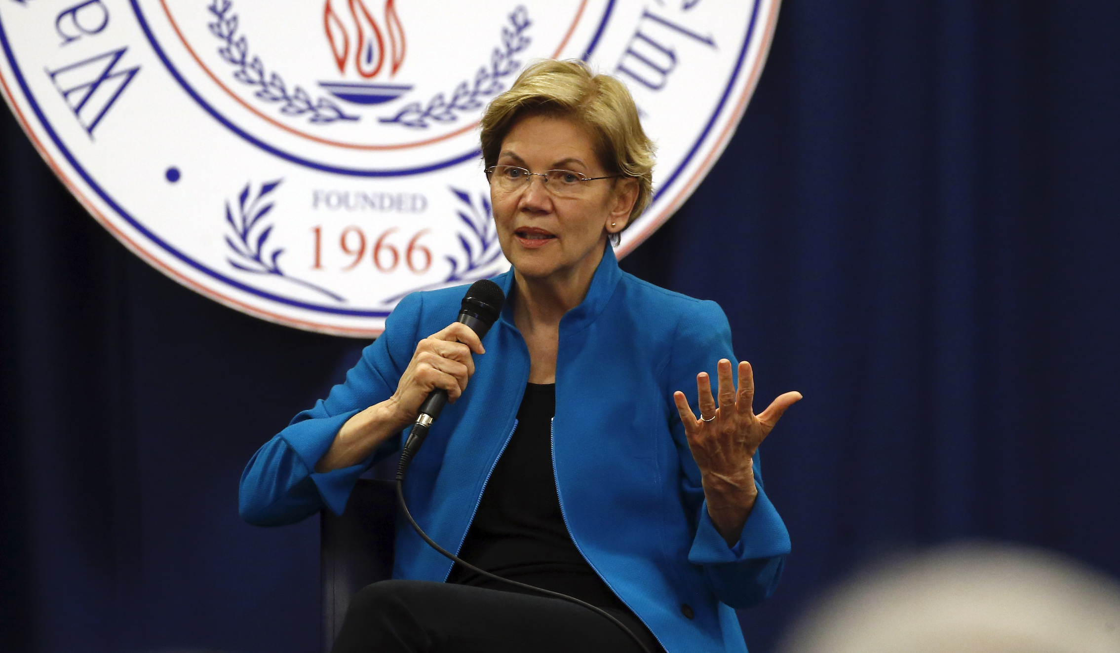 Bernie Sanders supporters signal for Warren to drop out and endorse him