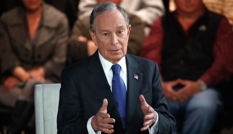 Bloomberg pressed on why he hasn't dropped out and backed Biden before Super Tuesday