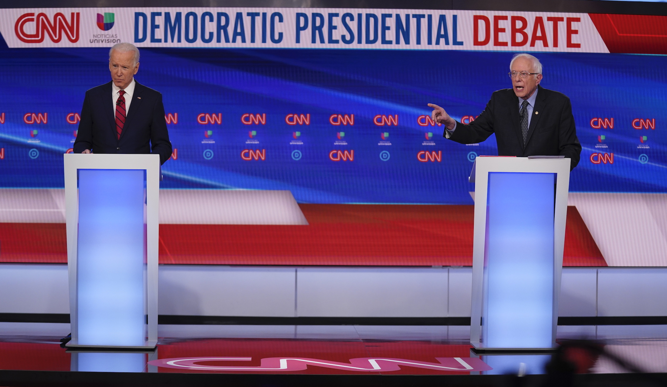 Biden and Sanders stand 6 feet apart at debate as coronavirus fears rise