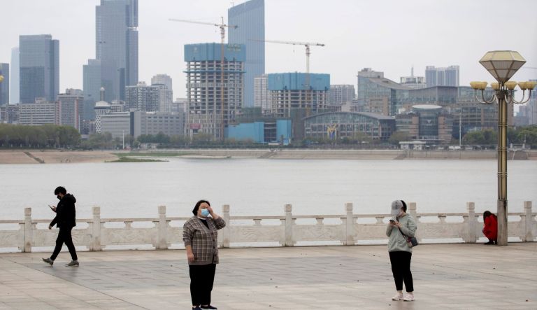 Accusing eyes turn on China as America plunges into pandemic hell week