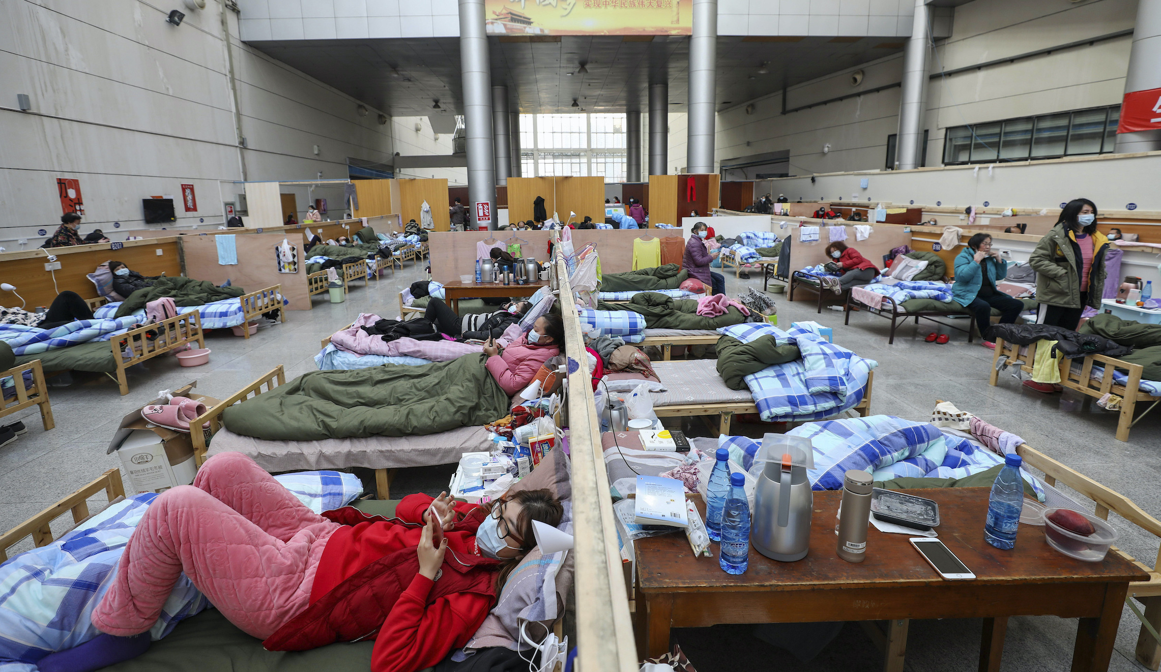 Satellite images show Wuhan hospitals swamped months before China reported coronavirus outbreak
