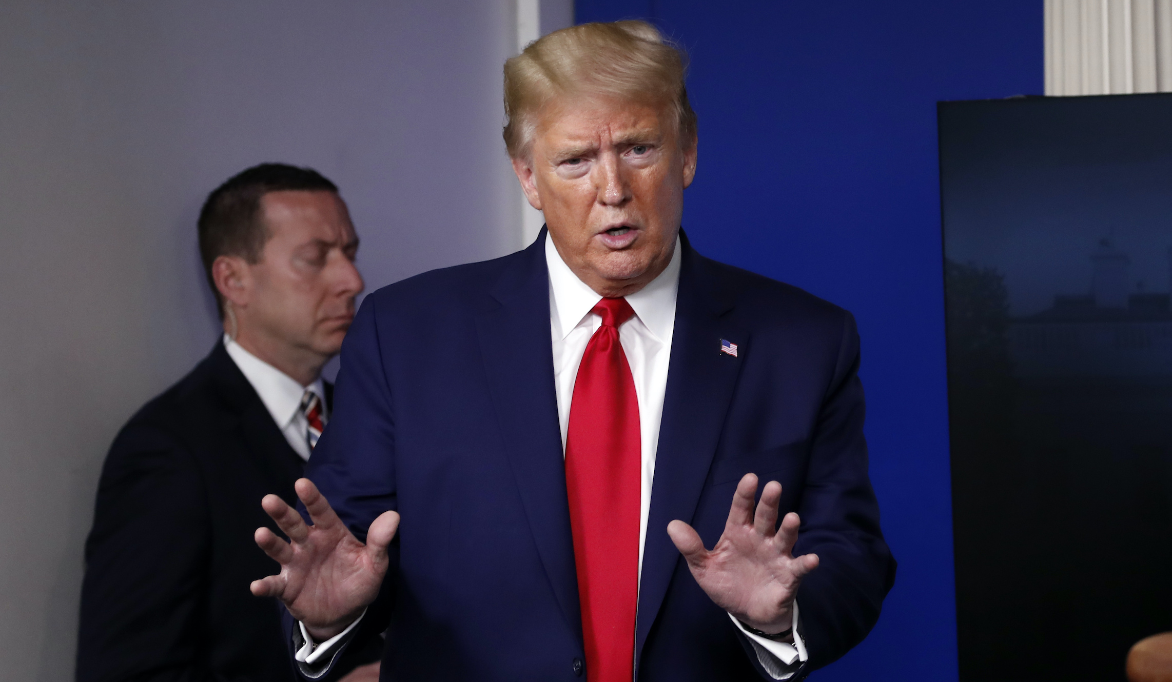 Experts disagree on benefits of Trump move to curtail legal immigration