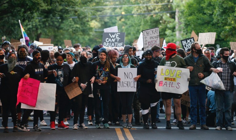 Protesters march through downtown Sacramento, Calif. in memory of George Floyd, Monday, June 1, 2020.  (AP Photo/Rich Pedroncelli)

