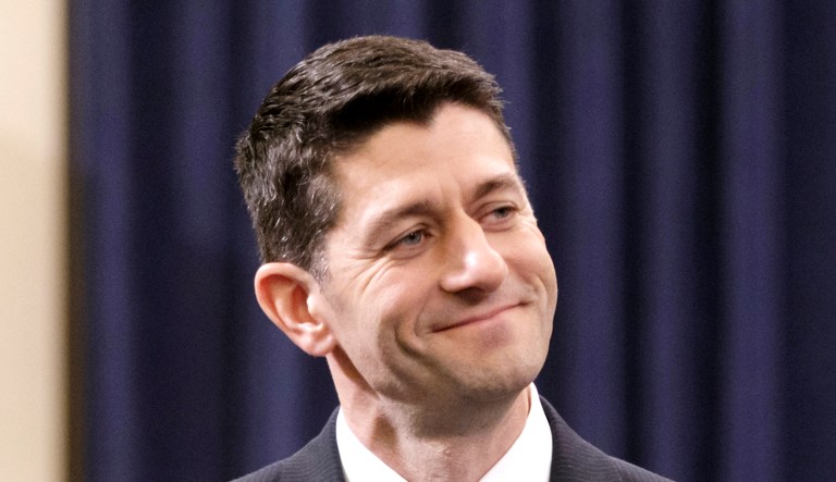 House Speaker Paul Ryan, R-Wis., smiles as he participates in an event.